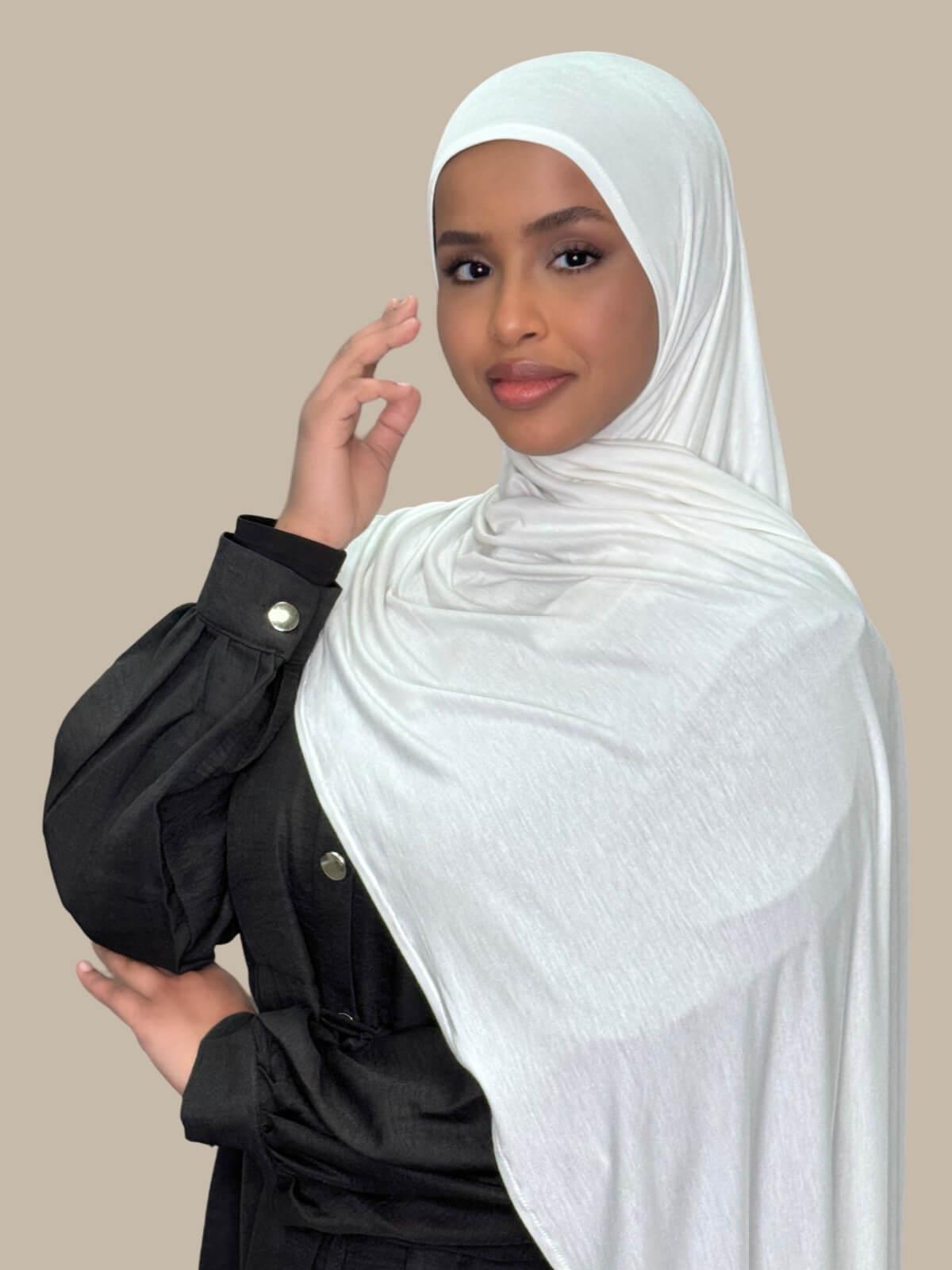 Off White Pre-Sewn Jersey Hijab, draped on the shoulder side view on model