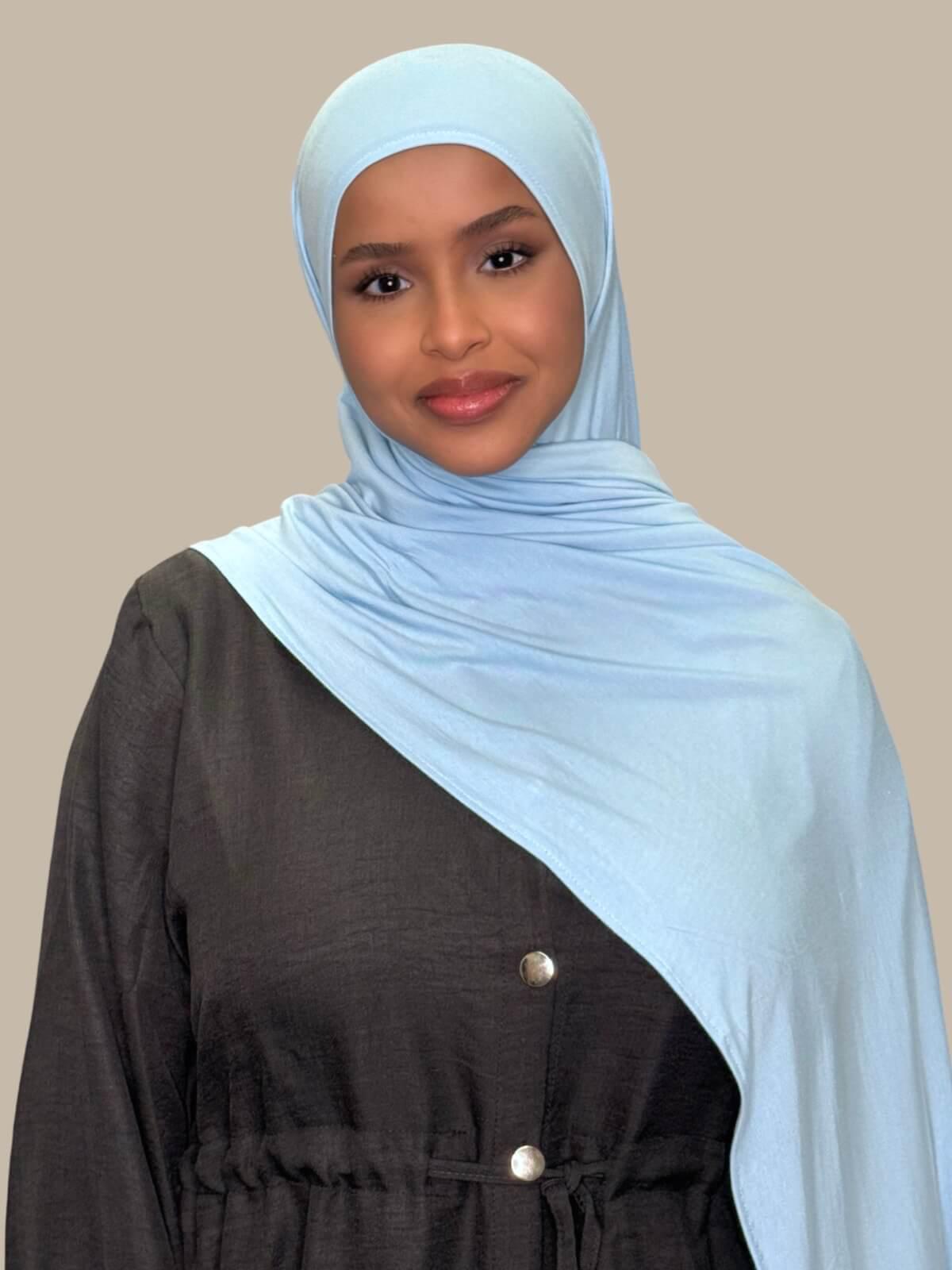 Baby Blue Pre-Sewn Jersey Hijab front view on model draped over shoulder
