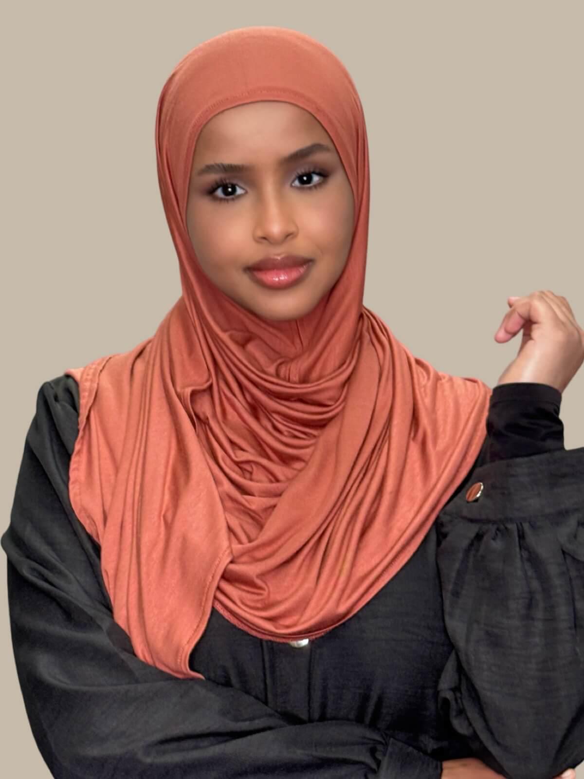Brick Red Pre-Sewn Jersey Hijab front view on model no pins