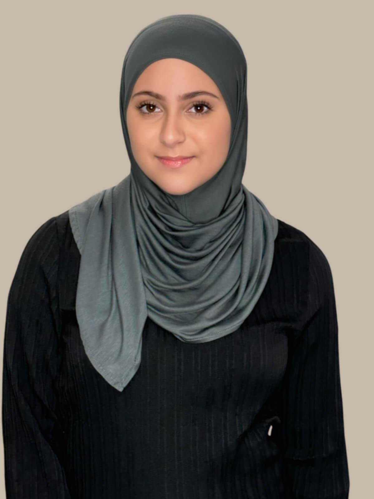 Pebble Grey Pre-Sewn Jersey Hijab in Modish Girl size, front view on model with hijab wrapped neatly around shoulders showing smooth fit and soft stretch fabric.