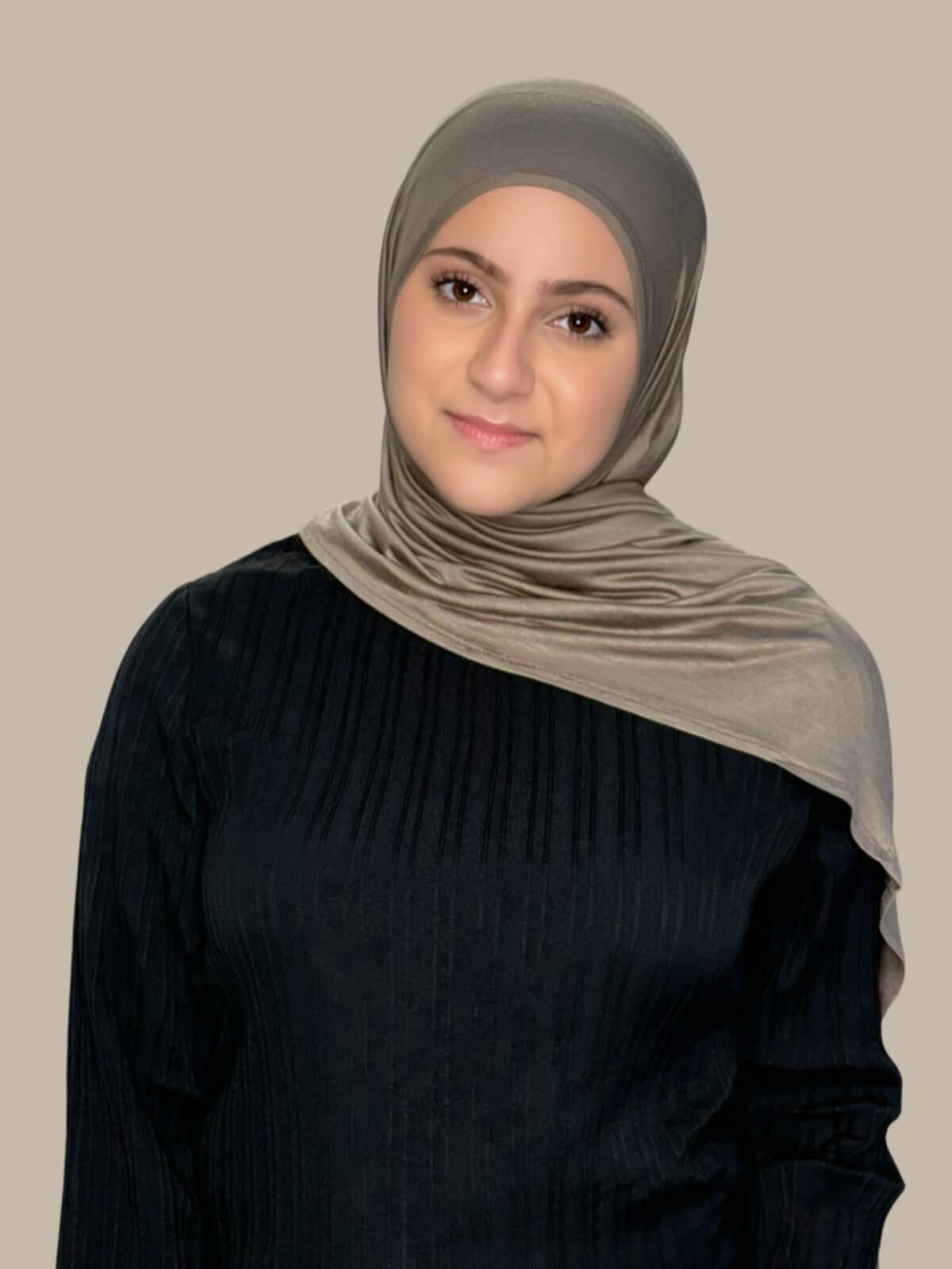 Sandstone Pre-Sewn Jersey Hijab in Modish Girl size, front view on model with hijab draped over shoulder, no pins
