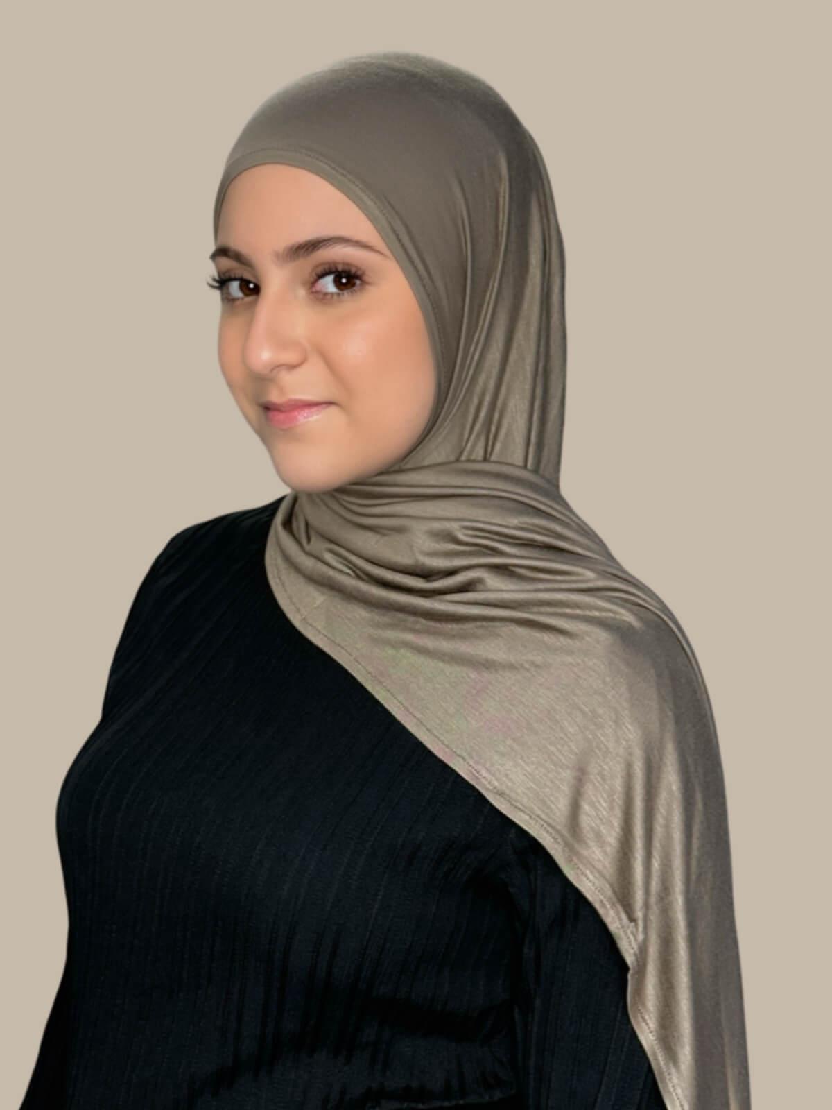 Sandstone Pre-Sewn Jersey Hijab in Modish Girl size, side view on model with hijab draped over shoulder showing smooth fit and soft stretch fabric.