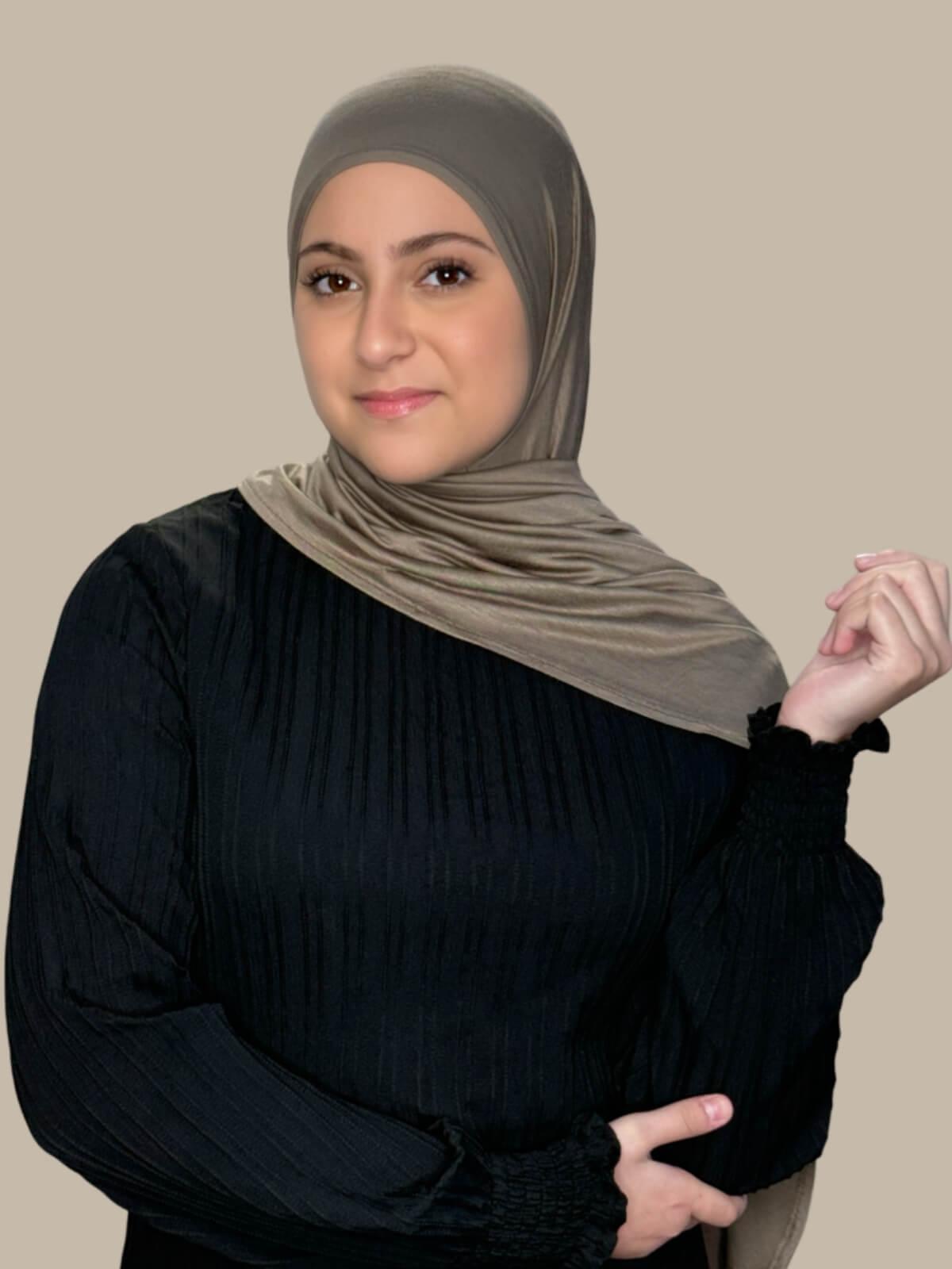 Sandstone Pre-Sewn Jersey Hijab in Modish Girl size, front view on model with hijab draped over shoulder showing smooth fit and soft stretch fabric.