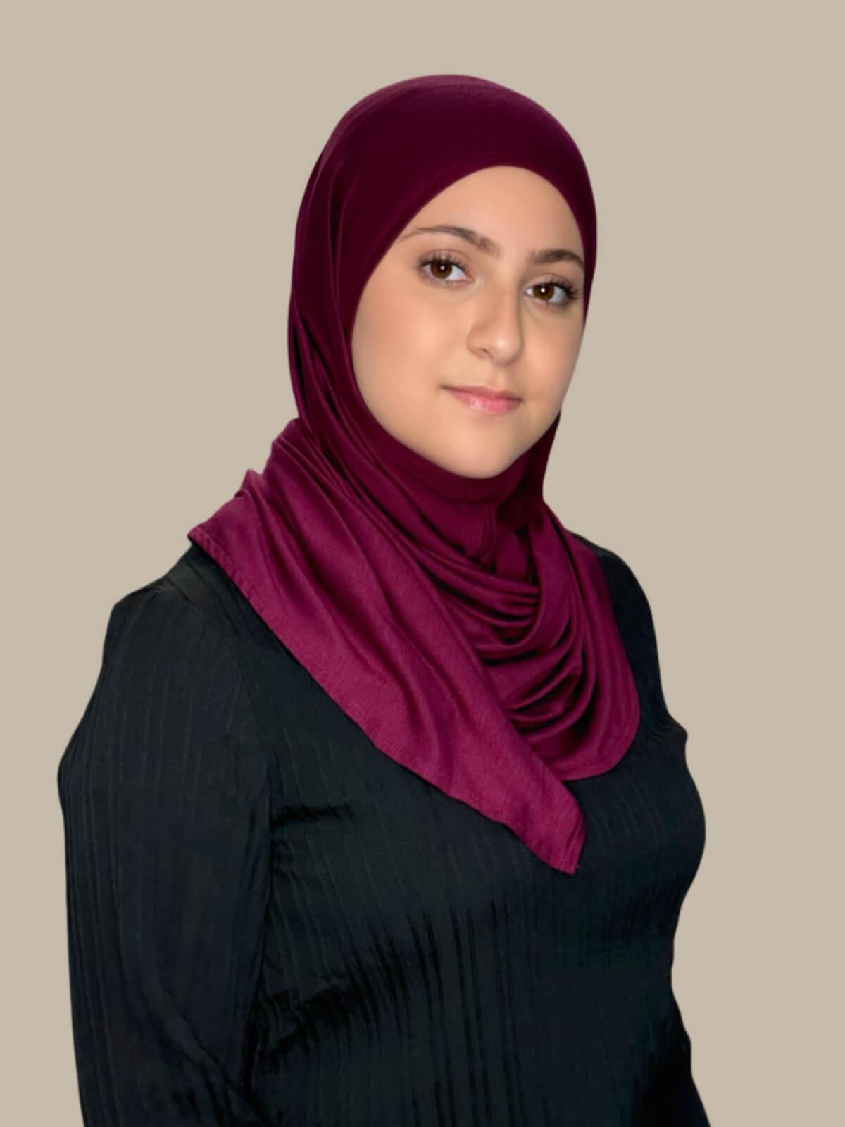Burgundy Pre-Sewn Jersey Hijab in Modish Girl size, front view on model, no pins