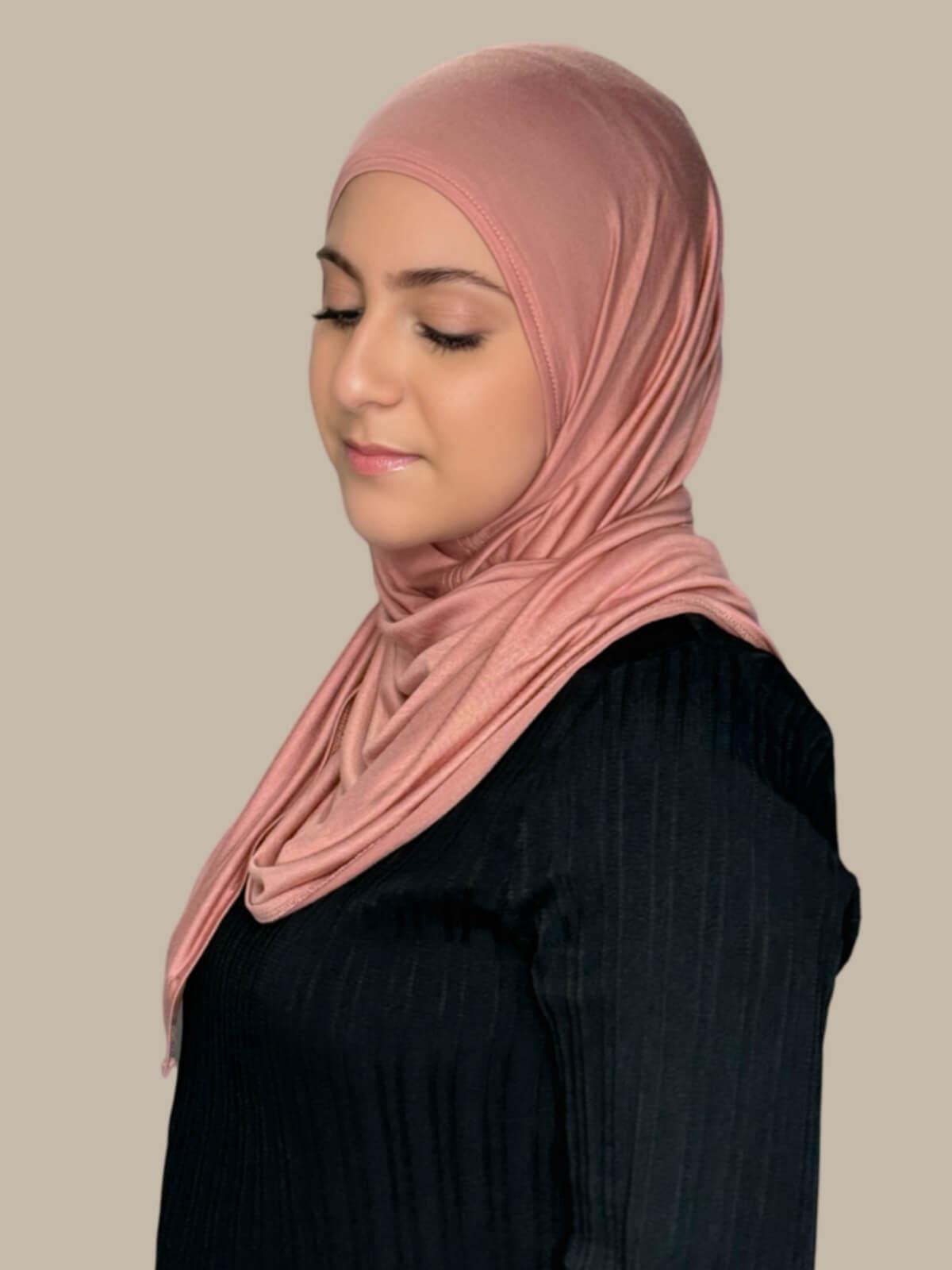 Wood Rose Pre-Sewn Jersey Hijab in Modish Girl size, side view on model with hijab wrapped neatly around shoulders showing smooth fit and soft stretch fabric. Effortless to wear 