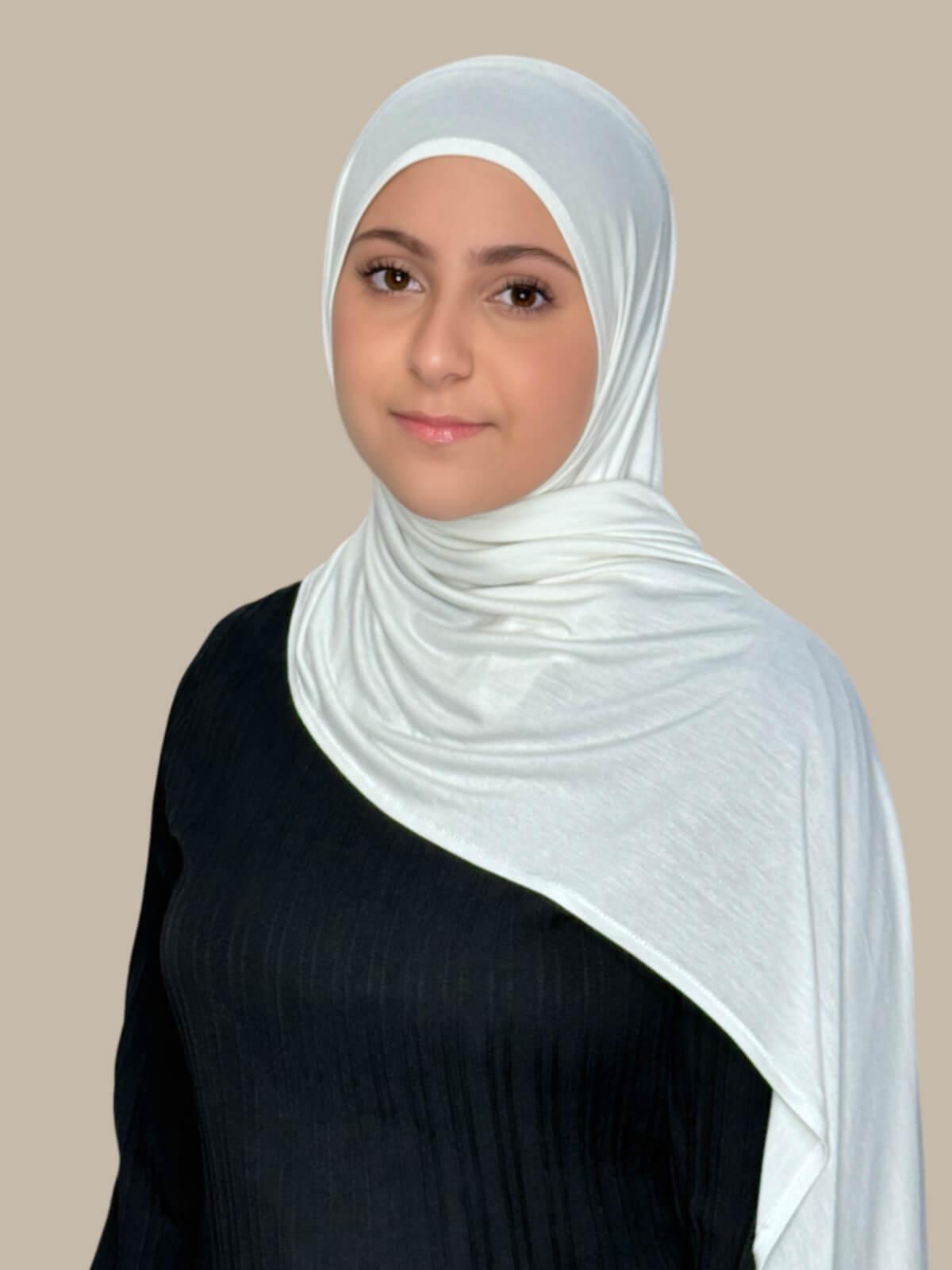 Off White Pre-Sewn Jersey Hijab in Modish Girl size, closeup on model with hijab draped over shoulder showing smooth fit and soft stretch fabric.