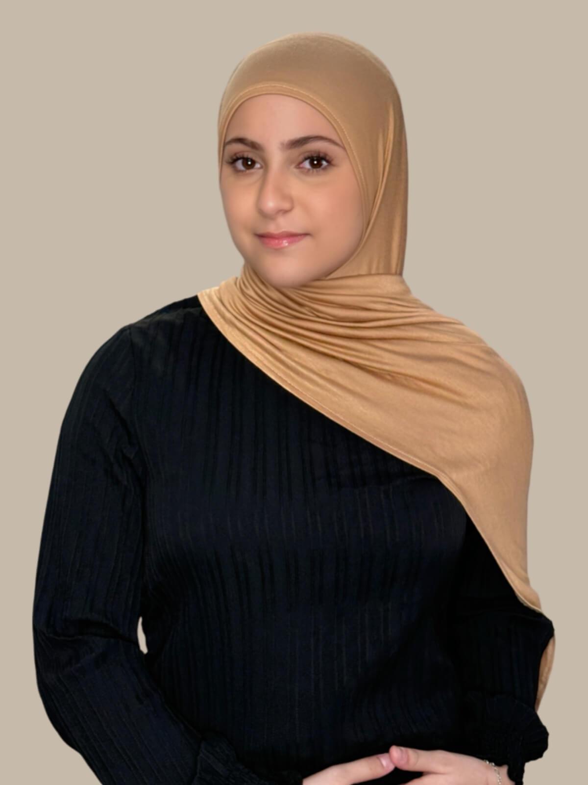 Honey Pre-Sewn Jersey Hijab in Modish Girl size, front view on model with hijab draped over shoulder, no pins